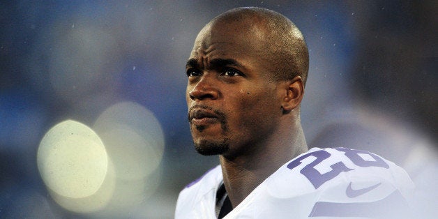 NASHVILLE, TN - AUGUST 28: Running back Adrian Peterson #28 of the Minnesota Vikings looks on during a preseason game against the Tennessee Titans at LP Field on August 28, 2014 in Nashville, Tennessee. (Photo by Ronald C. Modra/Sports Imagery/ Getty Images)