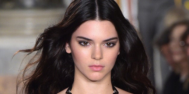MILAN, ITALY - SEPTEMBER 20: Kendall Jenner walks the runway during the Pucci - Show as part of Milan Fashion Week Womenswear Spring/Summer 2015 on September 20, 2014 in Milan, Italy. (Photo by Pier Marco Tacca/Getty Images)