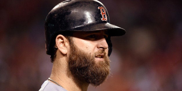 ANAHEIM, CA - AUGUST 09: Mike Napoli #12 of the Boston Red Sox waits to bat against the Los Angeles Angels of Anaheim at Angel Stadium of Anaheim on August 9, 2014 in Anaheim, California. (Photo by Lisa Blumenfeld/Getty Images)