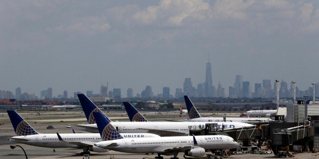 United Airlines jets are seen at the gate at Newark Liberty International Airport, Tuesday, July 22, 2014, in Newark, N.J. In a sign of increased caution about flying near combat zones, U.S. and European airlines halted flights to Israel Tuesday after a rocket landed near Tel Aviv's Ben Gurion Airport. Delta Air Lines and United Airlines suspended service between the U.S. and Israel indefinitely. The actions come days after a Malaysia Airlines jet was shot down over eastern Ukraine with 298 people on board. (AP Photo/Julio Cortez)