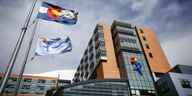 AURORA, CO - SEPTEMBER 30: The Children's Hospital Colorado, which has seen 10 patients with respiratory enterovirus EV-D68 after an outbreak in the state, is seen on September 30, 2014 in Aurora, Colorado. Enterovirus 68 is similar to the common cold, but symptoms can be more serious, according to the U.S. Centers for Disease Control and Prevention, causing wheezing and in some instances, neurological symptoms and temporary paralysis. (Photo by Marc Piscotty/Getty Images)