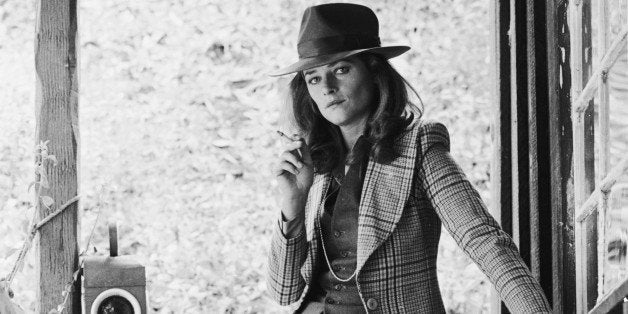 English actress Charlotte Rampling wearing a tweed jacket and trilby, February 1976. (Photo by Terry O'Neill/Hulton Archive/Getty Images)