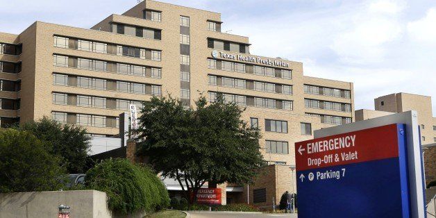 A sign points to the entrance to the emergency room at Texas Health Presbyterian Hospital Dallas, where U.S. Ebola patient Thomas Eric Duncan was being treated, Wednesday, Oct. 8, 2014, in Dallas. The hospital said Wednesday that Duncan has died. (AP Photo/LM Otero)