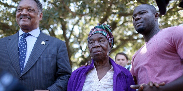 DALLAS, TX - OCTOBER 07: Rev. Jesse Jackson (L) stands with Nowai korkoyah (C) the mother of Ebola patient Thomas Eric Duncan, as well as his nephew, Josephus Weeks, after they spoke to the media at the Texas Health Presbyterian hospital on October 7, 2014 in Dallas, Texas. Rev. Jesse Jackson was visiting Dallas to show support of Ebola patient Thomas Eric Duncan and his family. (Photo by Joe Raedle/Getty Images)