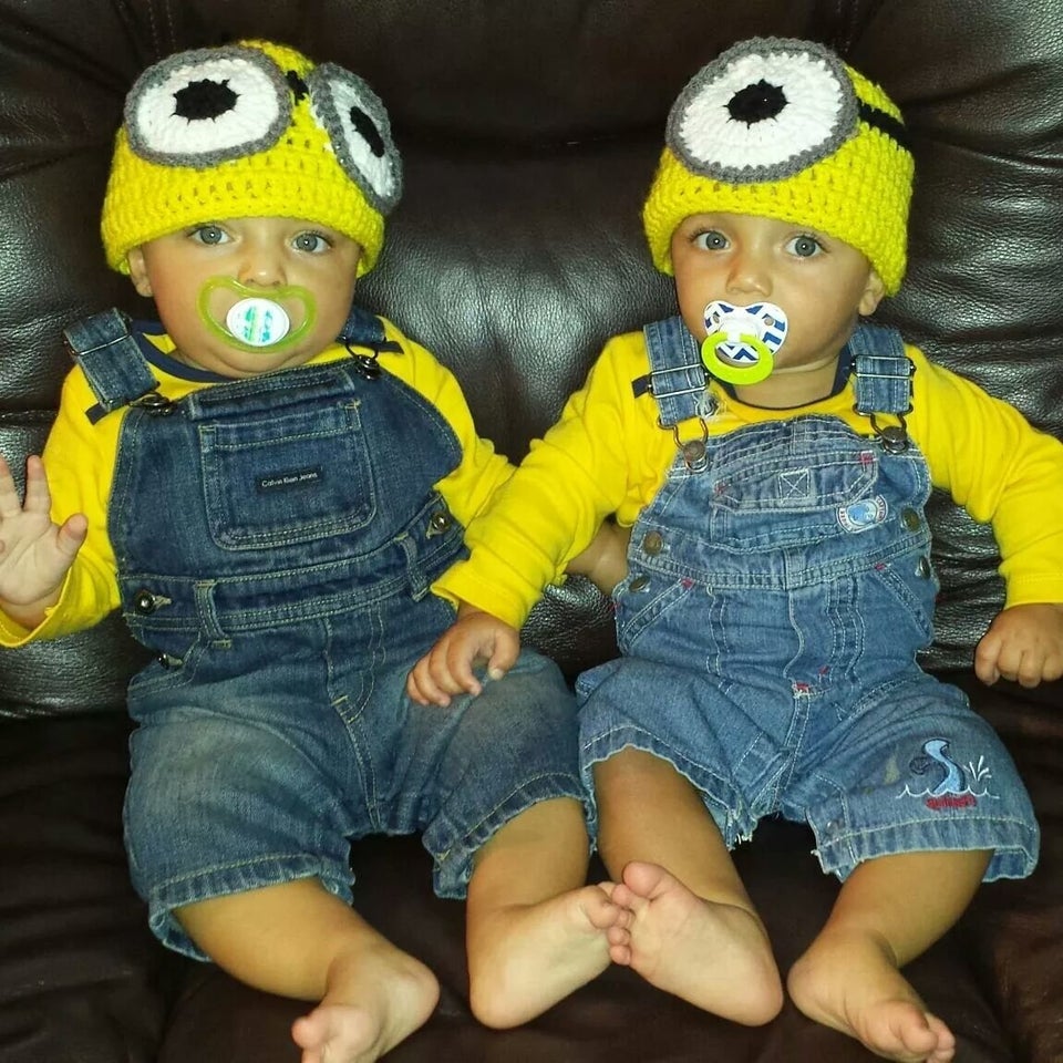 twin babies in halloween costumes