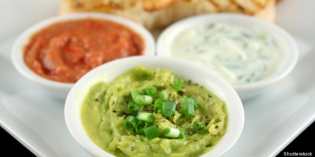 three dips comprising guacamole ...