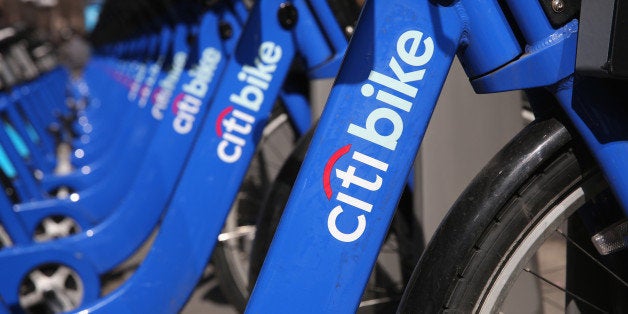 NEW YORK, NY - MARCH 21: Citi Bikes await riders at a bicycle station in Manhattan on March 21, 2014 in New York City. The leaders of Citi Bike are trying to raise millions of dollars to keep the money-losing bike-share program in business, following a severe winter which greatly reduced bicycle usage in New York City. (Photo by John Moore/Getty Images)