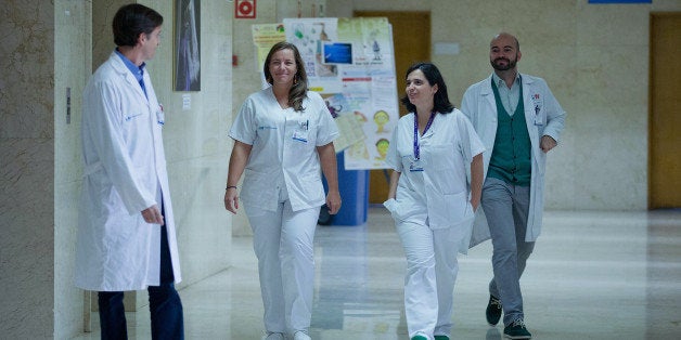 MADRID, SPAIN - OCTOBER 21: Specialist doctor in infectious illnesses Jose Ramon Arribas (L) and specialist doctors in tropical medicine Marta Arsuaga (2L), Marta Mora (2R) and Fernando de la Calle (R) arrive to attend a press conference about the health of Ebola patient Teresa Romero at Carlos III hospital on October 21, 2014 in Madrid, Spain. Spanish Nurse Teresa Romero has tested twice negative for Ebola after two weeks suffering the illness. Teresa Romero was the first person outside West Africa to contract Ebola during the 2014 spread. (Photo by Gonzalo Arroyo Moreno/Getty Images)