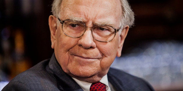 Warren Buffet, chairman and chief executive officer of Berkshire Hathaway Inc., listens during a Bloomberg Television Interview in New York, U.S., on Wednesday, April 23, 2014. Buffett discussed the possibility of his company eventually becoming more involved in housing finance once lawmakers resolve future of Fannie and Freddie. Photographer: Chris Goodney/Bloomberg via Getty Images