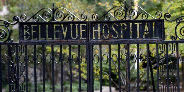 A sign on the gate for the entrance to Bellevue Hospital is viewed on October 24, 2014 in New York, the morning after it was confirmed that Craig Spencer, a member of Doctors Without Borders, who recently returned to New York from West Africa tested positive for Ebola. New York confirmed the first case of Ebola in the largest city in the United States as the EU dramatically ramped up aid Friday to contain the killer epidemic ravaging west Africa.The EU announcement of one billion euros ($1.3 billion) for the worst-hit countries comes as fears of a spread of the virus grew, with the first confirmed case in Mali, where a two-year-old girl has tested positive. Craig Spencer was placed in isolation at Manhattan's Bellevue Hospital Center, officials said. AFP PHOTO / Timothy A. Clary (Photo credit should read TIMOTHY A. CLARY/AFP/Getty Images)
