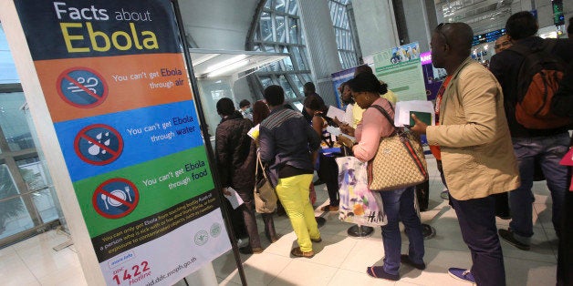 Tourists queue up at Suvarnbhumi Airport to give their health record before leaving the airport in Bangkok Thailand Monday, Oct . 27, 2014. The longer the Ebola outbreak rages in West Africa, the greater chance a traveler infected with the virus touches down in an Asian city.(AP Photo/Sakchai Lalit)