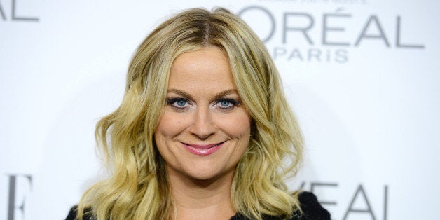 Amy Poehler arrives at ELLE's 21st annual Women In Hollywood Awards at the Four Season Hotel on Monday, Oct. 20, 2014, in Los Angeles. (Photo by Jordan Strauss/Invision/AP)