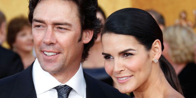Jason Sehorn (L) and Actress Angie Harmon arrives at the 17th Annual Screen Actors Guild Awards held at The Shrine Auditorium on January 30, 2011 in Los Angeles, California. (Photo by Jeff Vespa/WireImage)