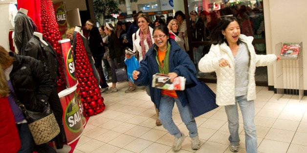 Shoppers enter a J.C. Penney store at 4 a.m. at Simon Property Group's Great Lakes Mall in Mentor, Ohio, U.S., on Friday, Nov. 26, 2010. Shoppers on Black Friday, the biggest shopping day of the year, are taking advantage of deals as they face down a slower economic recovery than projected. Photographer: Daniel Acker/Bloomberg via Getty Images