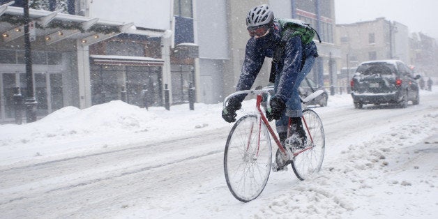 bicycle courier in winter snow...