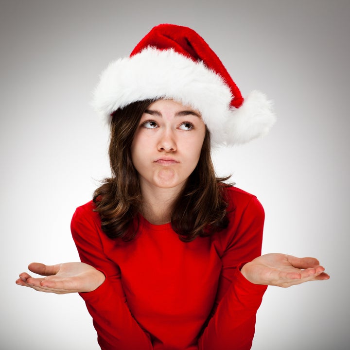 Portrait of beautiful girl wearing Santa Claus hat