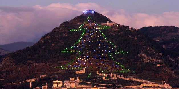 GUBBIO, ITALY: A Christmass tree decorates Mount Ingino, overlooking the Umbrian city of Gubbio, 11 December 2006. The tree is 650 meters long with a surface area around 1,000 square meters and covered by more than 4000 lights. AFP PHOTO / PAOLO TOSTI (Photo credit should read Paolo TOSTI/AFP/Getty Images)