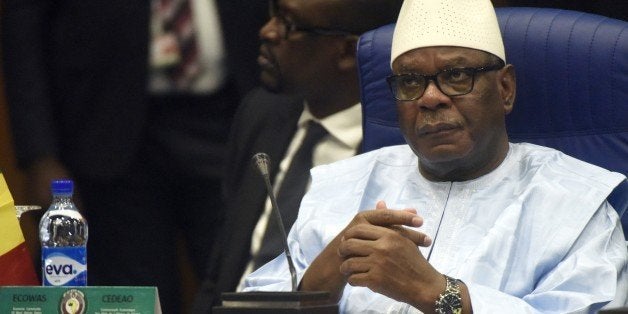 Malian President Ibrahim Keita attends the Summit of ECOWAS Heads of state and government in Abuja on December 15, 2014. Heads of states and government of ECOWAS are meeting in Abuja to discuss the on-going fight against the deadly Ebola virus disease that is ravaging the region, as well as the political and security situation in the region. AFP PHOTO/PIUS UTOMI EKPEI (Photo credit should read PIUS UTOMI EKPEI/AFP/Getty Images)