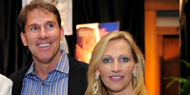 From left, ESPN anchor Hannah Storm, actor Hill Harrow, author Nicholas Sparks and his wife Cathy pose for a photo at a fan lunch at the inaugural Nicholas Sparks Celebrity Family Weekend on April, 20, 2012 in New Bern, North Carolina. The weekend includes a celebrity golf tournament, a 5K run, boat tours, a family fun night, and a screening of Sparks' new film The Lucky One. The weekendￃﾢￂﾀￂﾙs proceeds will benefit the Nicholas Sparks Foundation, which supports global education initiatives for youth through the Epiphany School in New Bern, NC, wounded warriors through Hope for the Warriors, and assistance dogs for people with disabilities through Paws With a Cause. (AP Photo/ Nicholas Sparks, WhoSay)