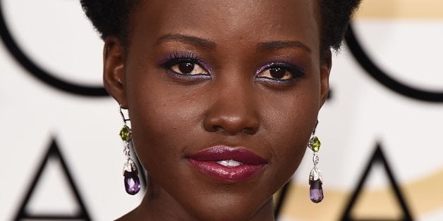 Lupita Nyong'o arrives at the 72nd annual Golden Globe Awards at the Beverly Hilton Hotel on Sunday, Jan. 11, 2015, in Beverly Hills, Calif. (Photo by Jordan Strauss/Invision/AP)