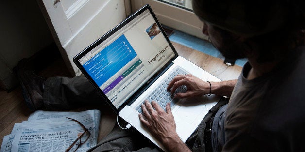 A young man search for a job on the website of job opportunities agency in Naples on May 3, 2012. Italy's unemployment rate hit a record of 9.8 percent in March from 9.6 percent in February, official data showed on May 2, as a recession in the eurozone's third-biggest economy deepens. The level, which has been rising from the start of recession last summer, was the highest since Italy began recording monthly figures in January 2004.AFP PHOTO / ANNA MONACO (Photo credit should read ANNA MONACO/AFP/GettyImages)