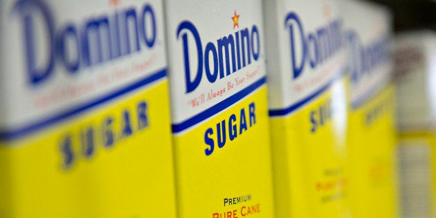 Domino Foods Inc. brand sugar sits on display at a supermarket in Princeton, Illinois, U.S., on Tuesday, June 4, 2013. The Food and Agriculture Organization of the United Nations will release its monthly food price index on June 6. The index, a measure of the monthly change in international prices of a basket of food commodities, consists of the average of five commodity group price indices including meat, dairy, grains, oil and sugar. Photographer: Daniel Acker/Bloomberg via Getty Images