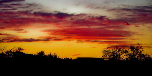 I have a thing for silhouetted sunsets. I stand at the window and wait and shoot and watch the colors emerge and change and fade away, minute by minute. There's always a narrow range of images in which color intensity peaks and from that group I select my "keepers".