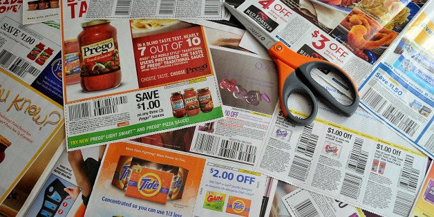 With AFP Story by Fabienne Faur: Lifestyle-US-economy-consumer
Coupons from the advertising section of the Sunday newspaper September 13, 2011 in Washington, DC. The humble coupon -- which is the past gave consumers a few cents off soap or cereal -- has mushroomed into a lifestyle for millions of Americans with its own television programs, websites and trading platforms. A total of 167 billion coupons were distributed to US consumers in the first six months of 2011, according to the research firm NCH Marketing Services, and the value of redeemed coupons rose 5.3 percent to $2 billion. But it's not your grandmother's Sunday newspaper coupon clipping anymore. Websites with names like Southern Savers, livefabuless.com or thekrazycouponlady.com give consumers an edge on how to find the the right discounts in the art of 'couponing,' which has evolved into a verb. AFP PHOTO / Karen BLEIER (Photo credit should read KAREN BLEIER/AFP/Getty Images)