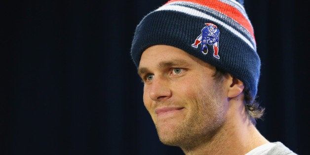 FOXBORO, MA - JANUARY 22: New England Patriots quarterback Tom Brady talks to the media during a press conference to address the under inflation of footballs used in the AFC championship game at Gillette Stadium on January 22, 2015 in Foxboro, Massachusetts. (Photo by Maddie Meyer/Getty Images)