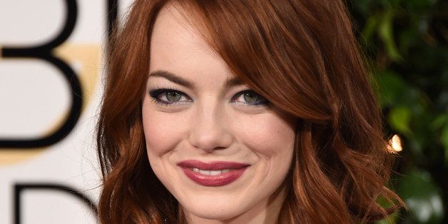 Emma Stone arrives at the 72nd annual Golden Globe Awards at the Beverly Hilton Hotel on Sunday, Jan. 11, 2015, in Beverly Hills, Calif. (Photo by Jordan Strauss/Invision/AP)