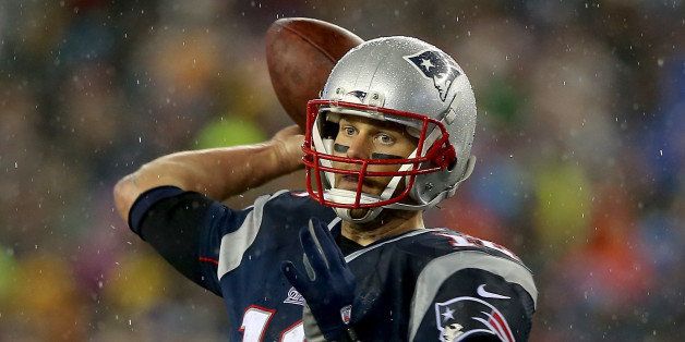 FOXBORO, MA - JANUARY 18: Tom Brady #12 of the New England Patriots in action against the Indianapolis Colts of the 2015 AFC Championship Game at Gillette Stadium on January 18, 2015 in Foxboro, Massachusetts. (Photo by Elsa/Getty Images)
