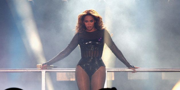 PARIS, FRANCE - SEPTEMBER 12: Beyonce performs during the 'On The Run Tour: Beyonce And Jay-Z' at the Stade de France on September 12, 2014 in Paris, France. (Photo by Myrna Suarez/WireImage for Parkwood Entertainment)