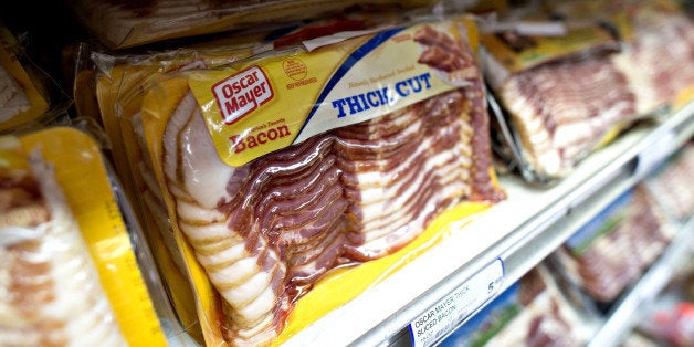 Kraft Foods Co. Oscar Mayer brand bacon sits on display at a supermarket in Princeton, Illinois, U.S., on Thursday, Aug. 14, 2014. Declining supplies of pigs that resulted from a deadly virus that spread across 30 states since the outbreak began last year have pushed up retail-bacon prices 10 percent in 2014 to $6.106 a pound in June, the highest since at least 1980. Photographer: Daniel Acker/Bloomberg via Getty Images