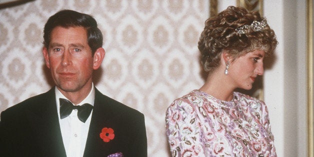 SOUTH KOREA - 1992: Prince Charles, Prince of Wales and Princess Diana, Princess of Wales, are at loggerheads during their tour of South Korea in 1992. Diana is wearing a mauve sheaf dress by Catherine Walker with a bolero of embroidered pastel flowers. (Photo by Anwar Hussein/WireImage)