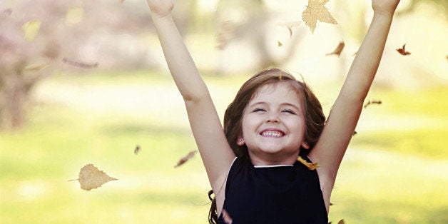 happy little girl in autumn