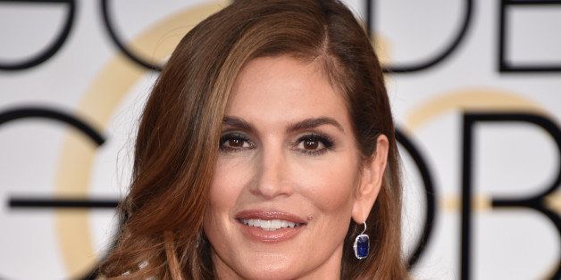 Cindy Crawford arrives at the 72nd annual Golden Globe Awards at the Beverly Hilton Hotel on Sunday, Jan. 11, 2015, in Beverly Hills, Calif. (Photo by John Shearer/Invision/AP)