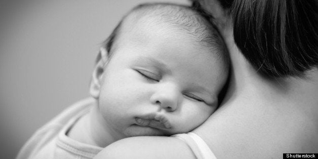 beautiful baby sleeping black...