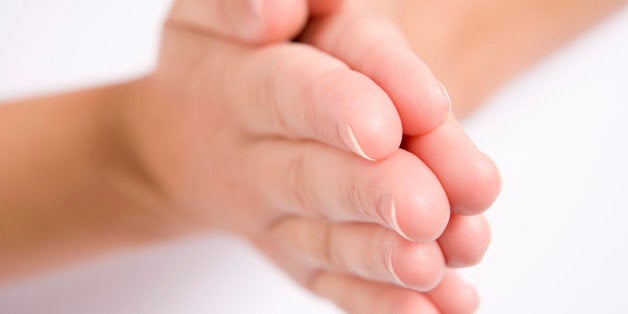 Woman's hands together in prayer