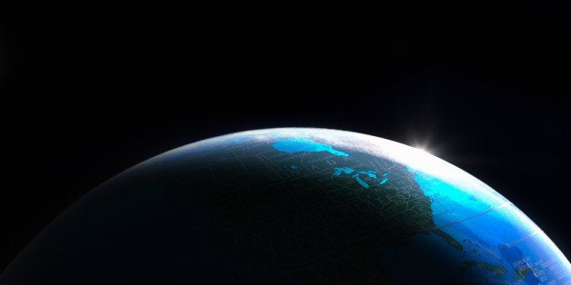 Globe shot to look like view of Earth from space with sunrise.