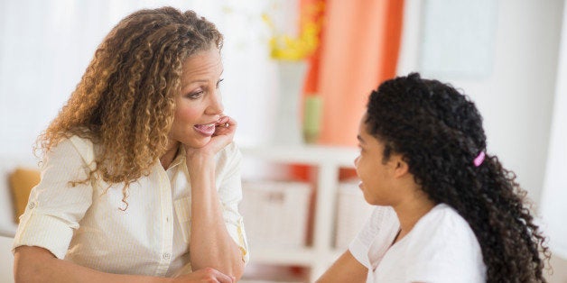 USA, New Jersey, Jersey City, Mother talking with daughters (10-11)