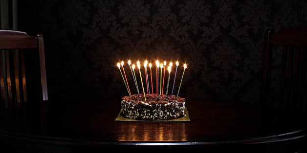 birthday cake on table in living room