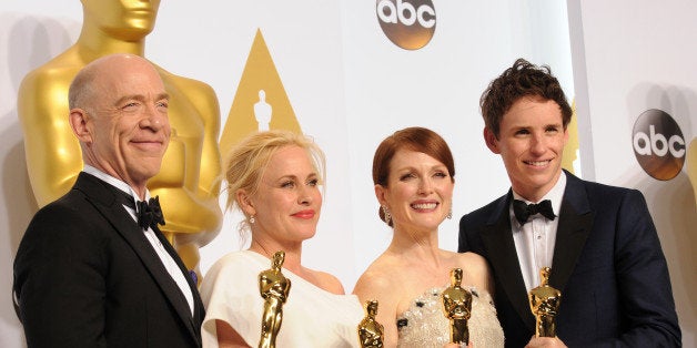 HOLLYWOOD, CA - FEBRUARY 22: Actors J.K. Simmons;, Patricia Arquette, Julianne Moore and Eddie Redmayne pose inside the press room of the 87th Annual Academy Awards held at Loews Hollywood Hotel on February 22, 2015 in Hollywood, California. (Photo by Albert L. Ortega/Getty Images)