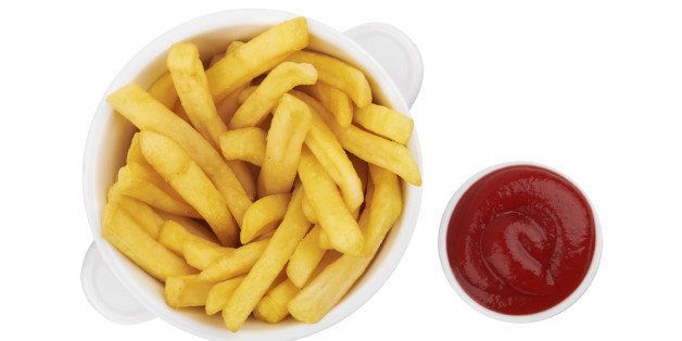 bowl of french fries isolated on a white background