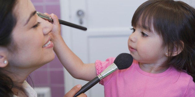 Two females playing with brushes