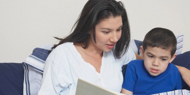 Mother and her son reading a book