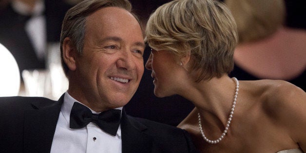 This image released by Netflix shows Kevin Spacey as U.S. Congressman Frank Underwood, left, and Robin Wright as Claire Underwood in a scene from the Netflix original series, "House of Cards." The new original series arrived in one big helping _ all 13 episodes of its first season _ on the subscription streaming service on Friday, Feb. 1, 2013, for viewers to enjoy, at their leisure, in the weeks, months or even years to come. (AP Photo/Netflix, Melinda Sue Gordon) (AP Photo/Netflix)