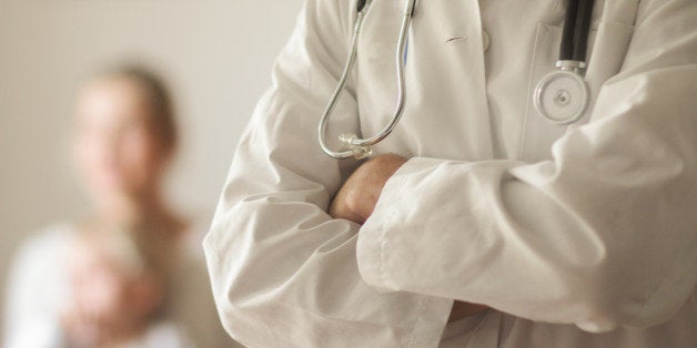 Cropped close up of male doctor in clinic