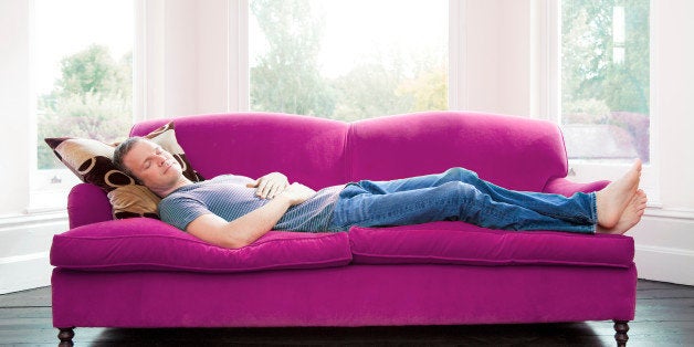 Man napping on sofa