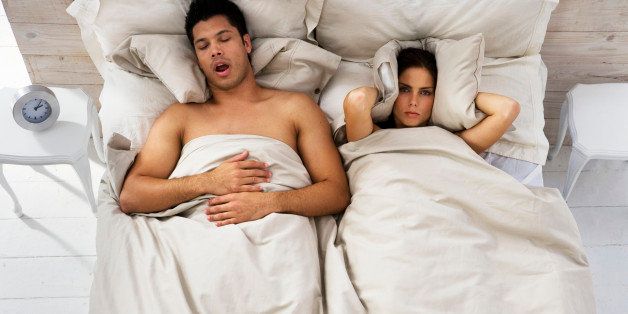 Woman Trying to Sleep While Man Snores
