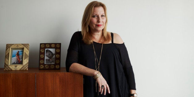 Paula Schneider, new chief executive officer of American Apparel Inc., stands for a photograph in her office at the company's factory in downtown Los Angeles, California, U.S., on Wednesday, Feb. 4, 2015. The company's spring marketing campaign will focus on the top 100 styles at American Apparel in a bid to remind consumers of all the basic items it offers - like a short black skirt and basic dresses - Schneider said. Photographer: Patrick T. Fallon/Bloomberg via Getty Images ** * Local Caption *** Paula Schneider